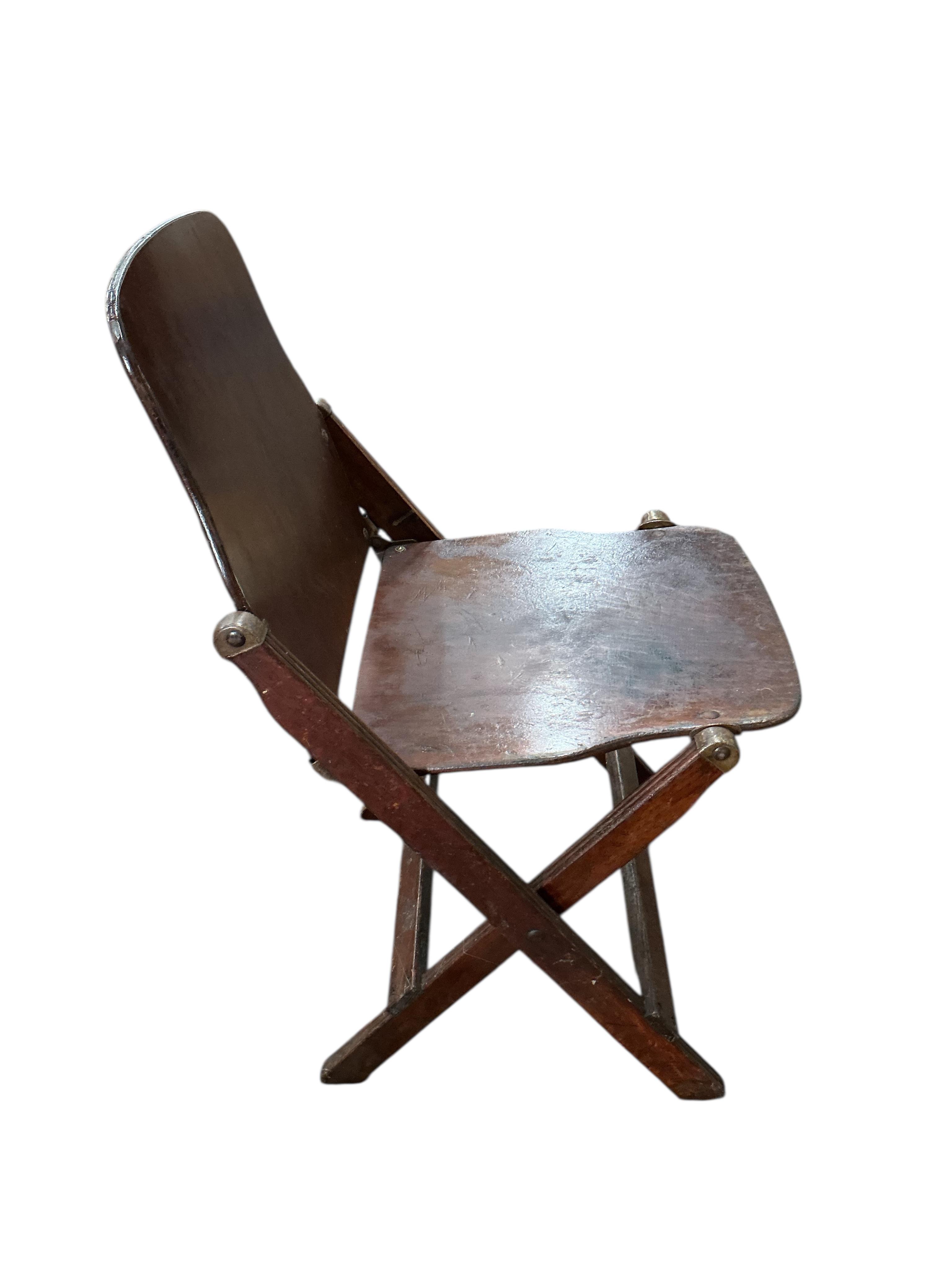 A pair of US administrative folding chairs, India, width 43cm, depth 39cm, height 76cm